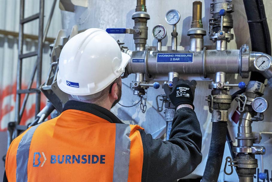 Close-up commercial photography of staff operating heavy machinery for Middlesbrough business branding
