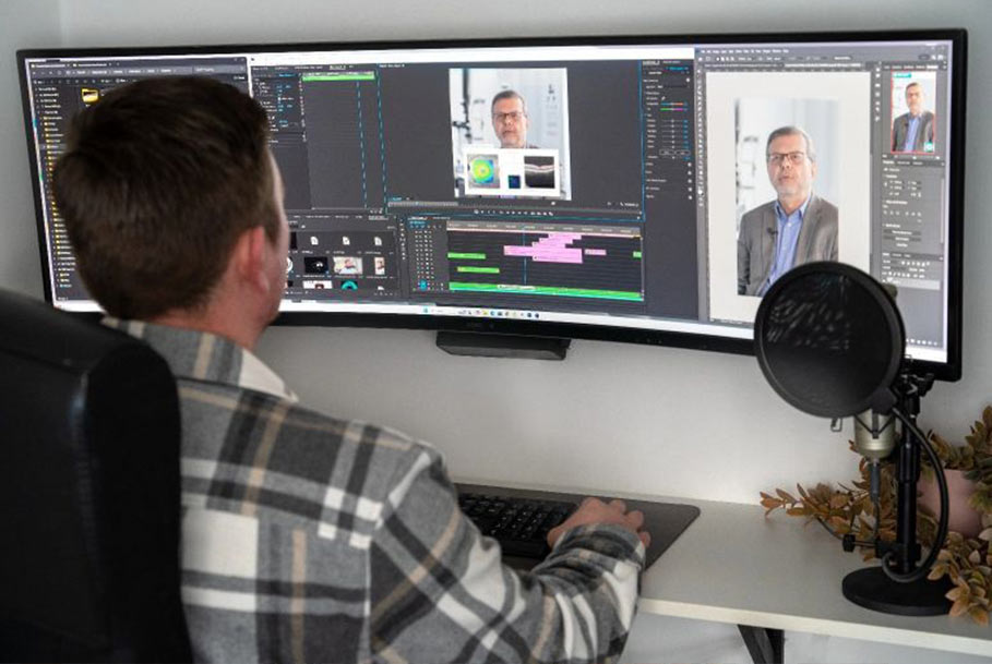 Jamie Kenley editing corporate video footage in post-production – Teesside video production studio