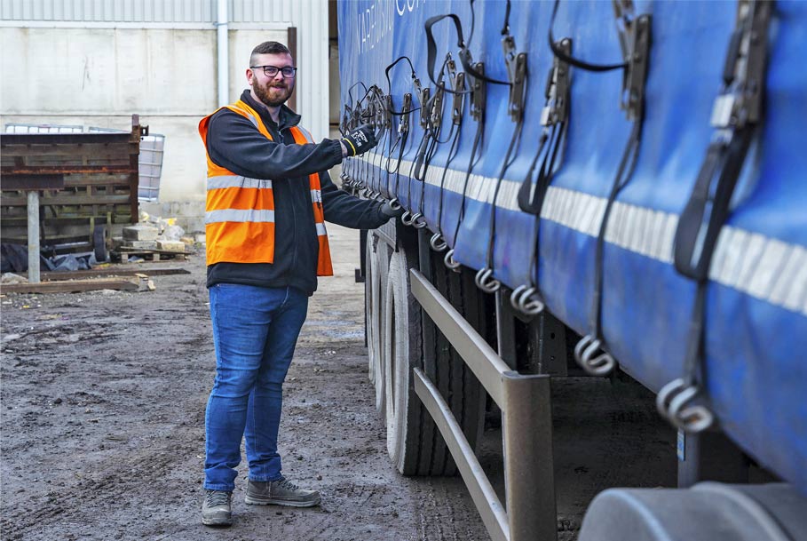 Staff member opening wagon traps on site – commercial branding photography in Middlesbrough