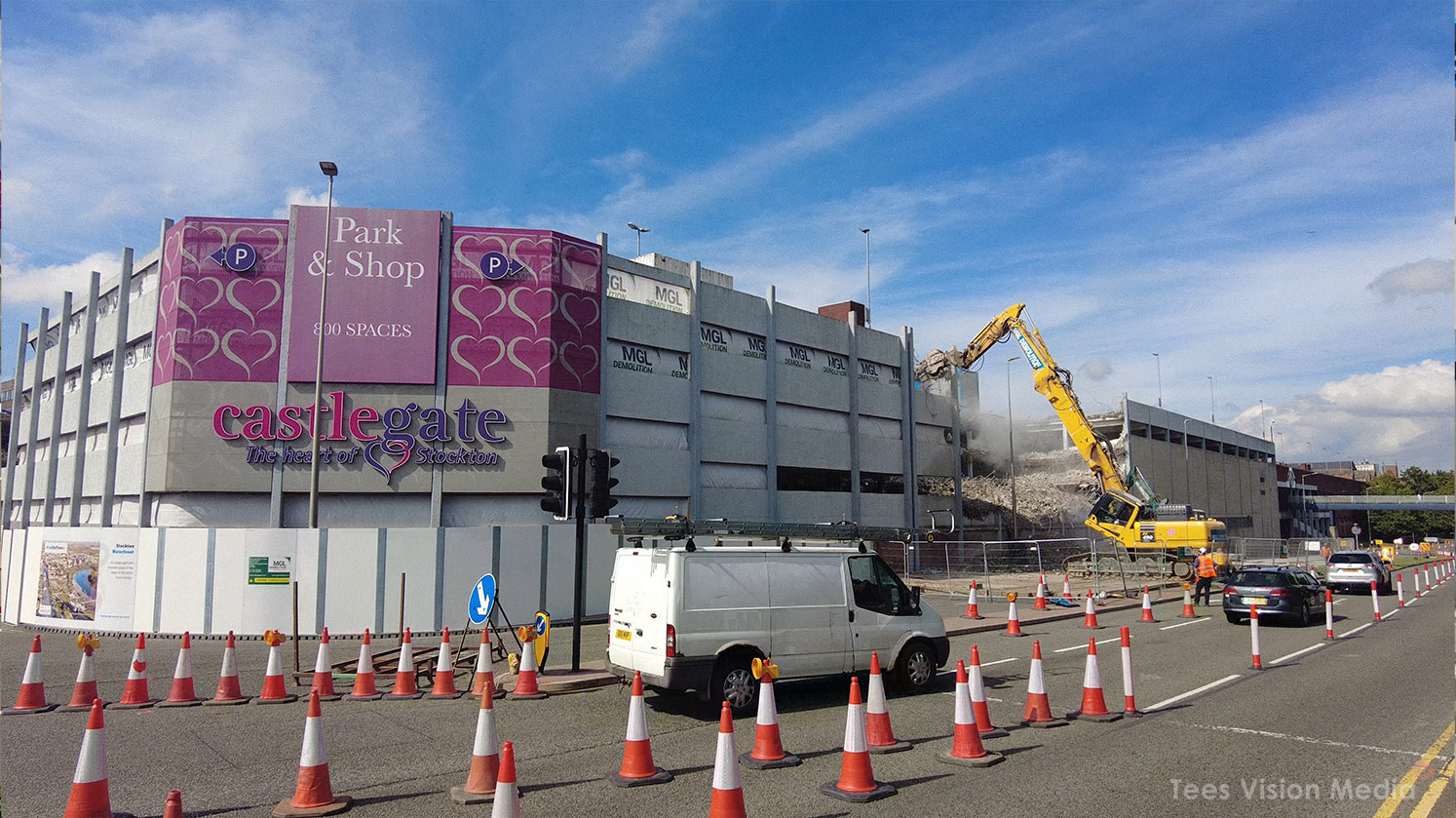 Castlegate Demolition with Park & Shop Sign Demolition machinery in front of the old Park & Shop / Castlegate building